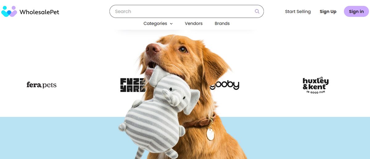 WholesalePet website featuring pet brands and a dog holding a plush toy